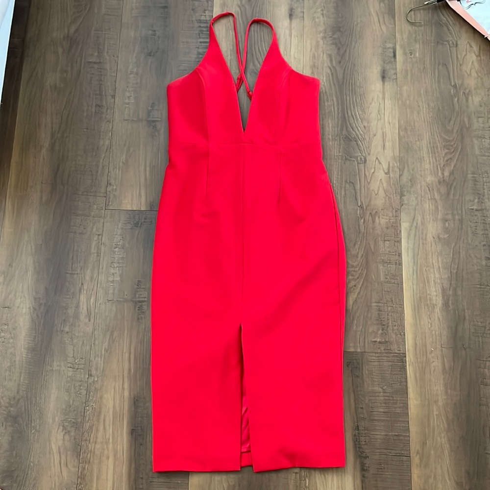 Red low-cut V Bardot cocktail dress.